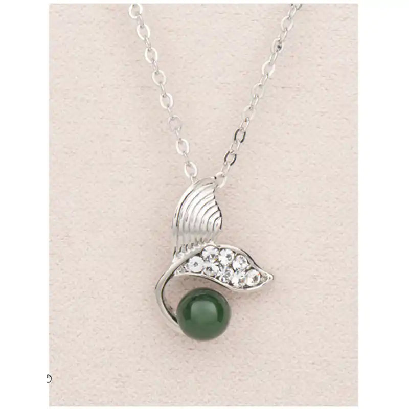 Jade cresting whale tail necklace