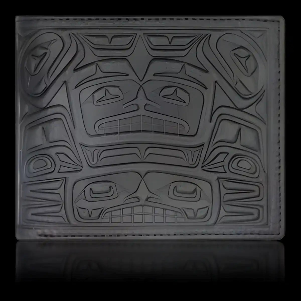 Leather wallet with native embossed bear lodge design