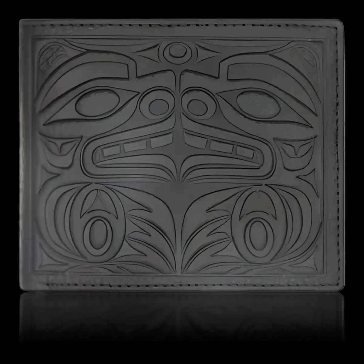 Leather wallet with native embossed formline bear