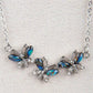 Glacier pearle butterfly trio necklace