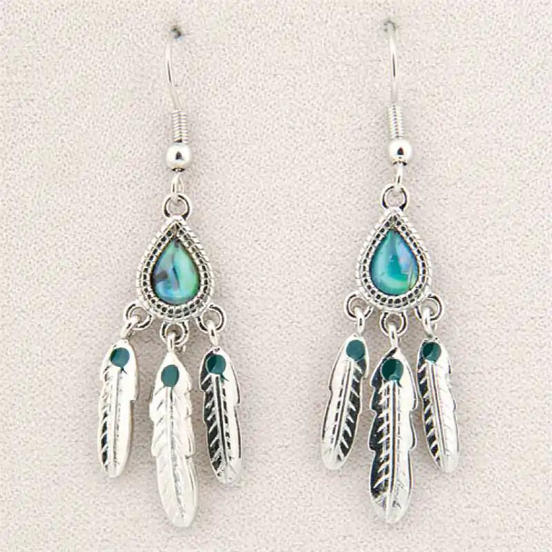 Glacier pearle tribal feathers earrings