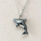 Hematite orca whale necklace