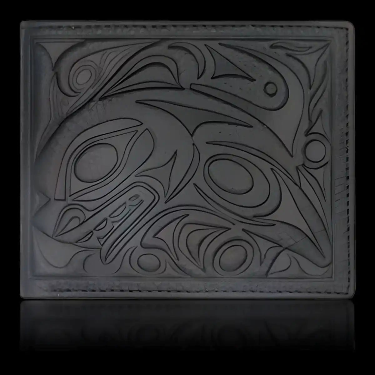 Leather wallet with native embossed orca design